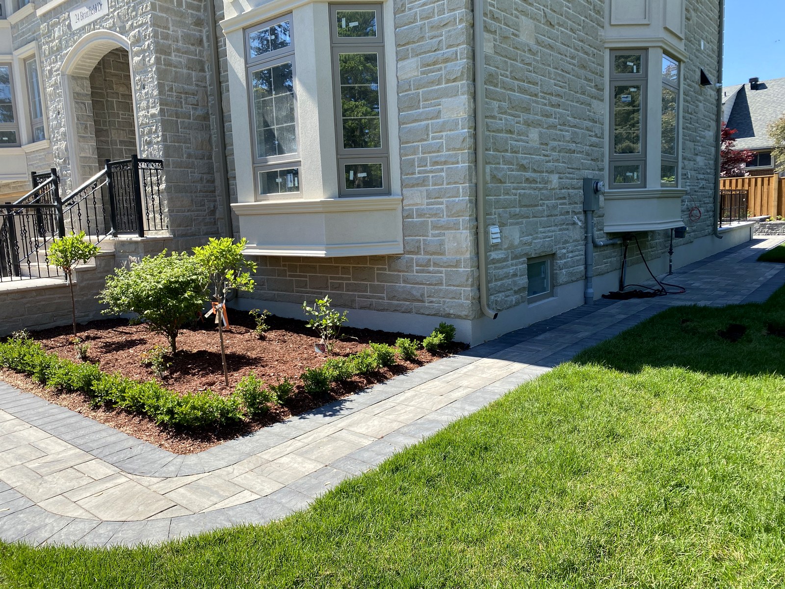 Finished landscaping and paver walkway