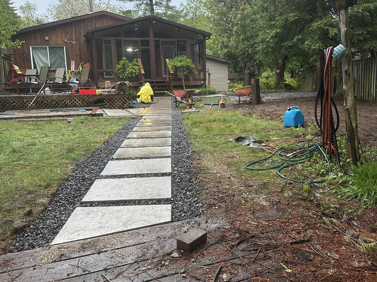Stepping-stone garden path installation in progress